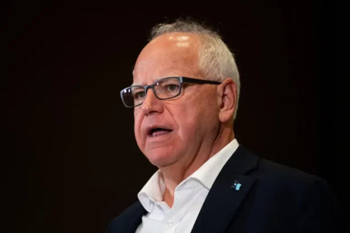Minnesota Governor Tim Walz served in the US Congress for 12 years [File: Stephen Maturen/Getty Images/AFP]