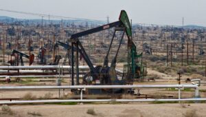 Pumpjacks, also known as nodding donkeys, operate above Chevron Corp. oil wells in the Midway-Sunset oil field near Taft, California, U.S., on Thursday, Feb. 11, 2010. (Getty Images)