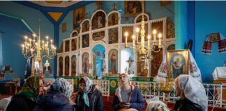 Zelensky Signs Law Banning Russia-linked Orthodox Church Members of the church choir, which switched from the Ukrainian Orthodox Church (UOC) to the Orthodox Church of Ukraine (OCU) rehearsing, amid Russia's attack on Ukraine, in the village of Hrabivtsi, Vinnytsia region, Ukraine April 22, 2023. REUTERS/Gleb Garanich