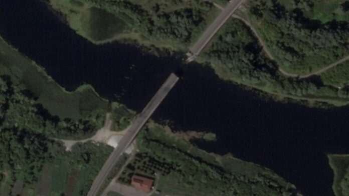 A satellite image of a collapsed bridge over the Seym river in the Glushkovo district after a strike on Saturday © Planet Labs Inc. via Reuters