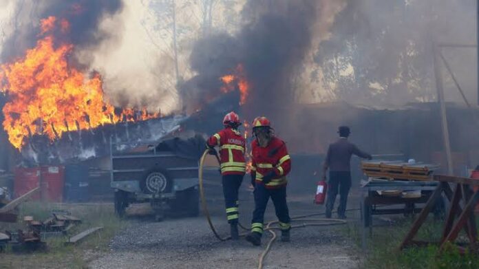 Thousands of firefighters tackle deadly blazes in Portugal. Copyright AP