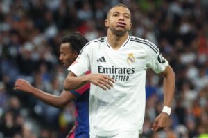 Real Madrid’s French forward #09 Kylian Mbappe gestures during the Spanish league football match between Real Madrid CF and FC Barcelona at the Santiago Bernabeu stadium in Madrid on October 26, 2024. (Photo by Pierre-Philippe MARCOU / AFP)