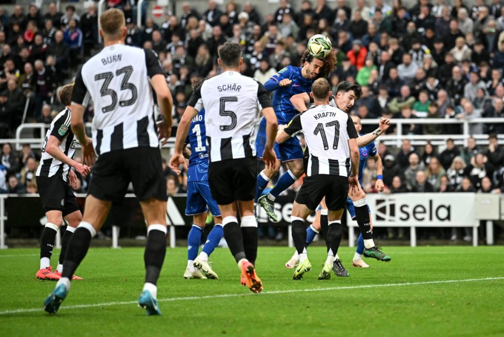 Chelsea’s Spanish defender #03 Marc Cucurella heads the ball during the English League Cup round of 16 football match between Newcastle United and Chelsea at St James’ Park in Newcastle-upon-Tyne, north east England on October 30, 2024. (Photo by ANDY BUCHANAN / AFP) 