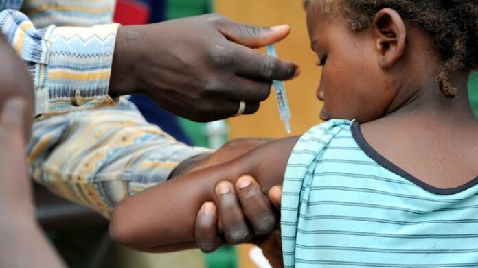 Photo of a child being vaccinated used to illustrate the story [Photo Credit: SundiataPost]