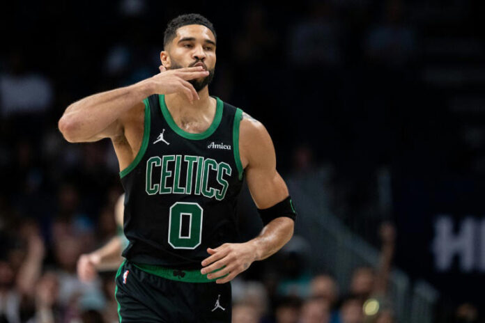Boston star Jayson Tatum reacts in the first quarter of the Celtics' win over the Charlotte Hornets© Jacob Kupferman