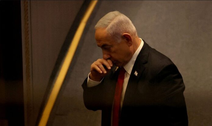 Israeli Prime Minister Benjamin Netanyahu attends a discussion on the subject of hostages kidnapped during the deadly October 7, 2023 attack, in Israel's parliament, the Knesset, in Jerusalem, November 18, 2024. Judges at the International Criminal Court have issued arrest warrants for Israeli Prime Minister Benjamin Netanyahu and his former defence chief, as well as a Hamas leader, Ibrahim Al-Masri, for alleged war crimes and crimes against humanity