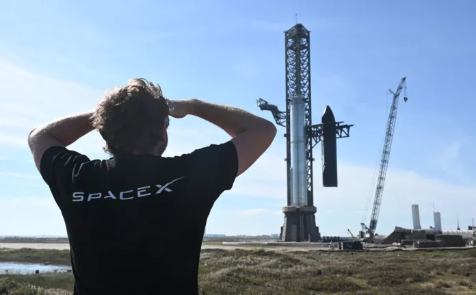 The Starship spacecraft, right, and Super Heavy booster, left, on the launchpad at Starbase in Boca Chica, Texas, in 2023.Photographer: Timothy A. Clary/AFP/Getty Images