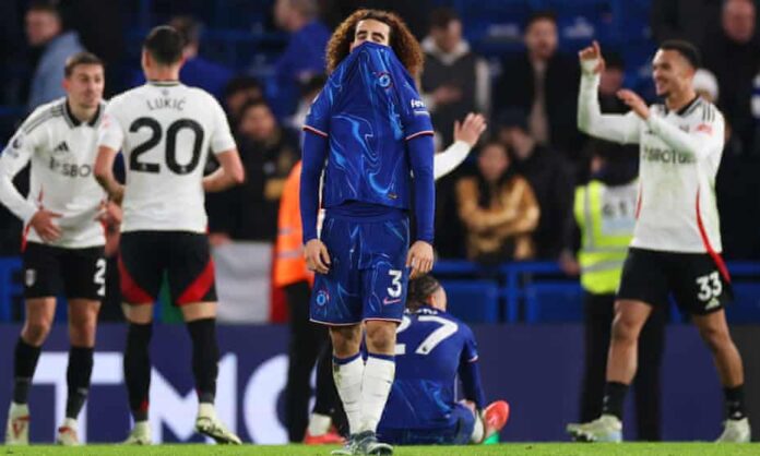 Marc Cucurella covers his face after Fulham stage a late comeback to win at Stamford Bridge. Photograph: Ryan Pierse/Getty Images
