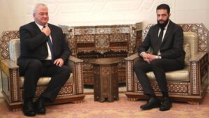 Ukrainian Foreign Minister Andrii Sybiha, at left, meets with Ahmad Al Sharaa, at right, in Damascus, on Dec. 30, 2024. Ali Haj Suleiman/Getty Images