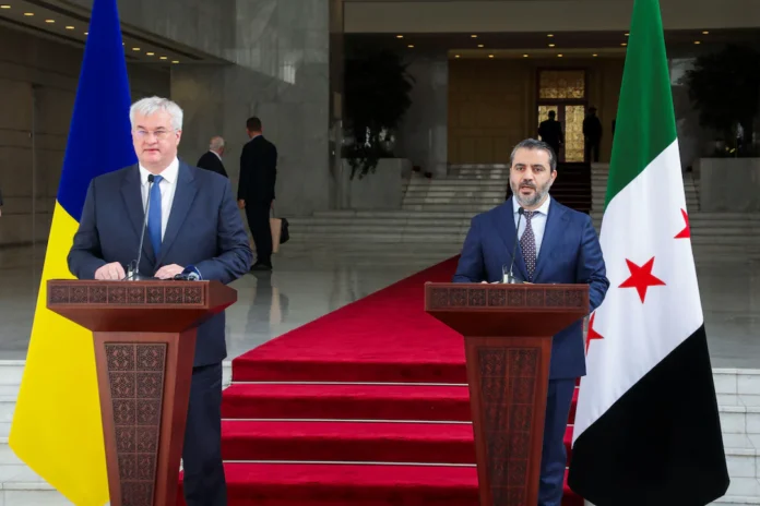 Ukrainian Foreign Minister Andrii Sybiha attends a press conference with Syria's foreign minister, Asaad Hassan al-Shibani, after the ousting of Syria's Bashar al-Assad, in Damascus, Syria, December 30, 2024. REUTERS/Khalil Ashawi