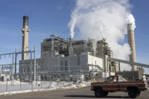 Steam billows from stacks at the Naughton Power Plant in Kemmerer, Wyoming, on January 12, 2022. The power plant is set to be closed in 2025, and TerraPower announced Kemmerer will be the site of a demonstration nuclear reactor.   Natalie Behring/AP