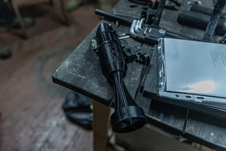 A 3D-printed casing for a strike drone munition, fabricated at a secret drone workshop operating as part of Ukraine's 68th Separate Jäger Brigade in a village outside Pokrovsk, Ukraine. Weapons like these have helped slow Russia's advance. Anton Shtuka for NPR