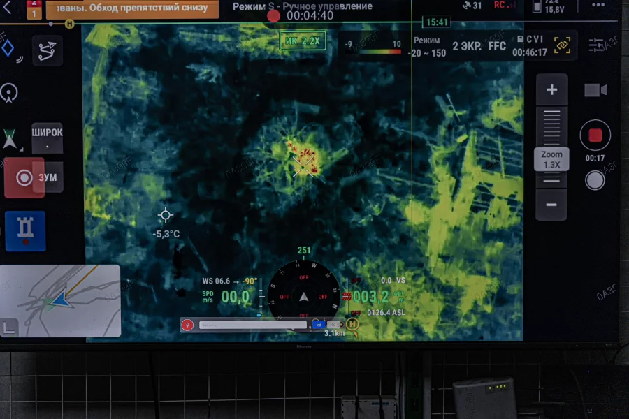 Image on the live stream screen of a night vision drone operating near Pokrovsk, Ukraine. Enemy Russian target detected. Anton Shtuka for NPR