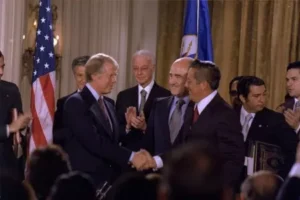 U.S. President Jimmy Carter and Panama's General Omar Torrijos shake hands after signing the Panama Canal Torrijos-Carter Treaties on September 7, 1977. President-elect Donald Trump has reignited debates about the decision, claiming that the U.S. "sold it under Jimmy Carter" for "one dollar." Less White House