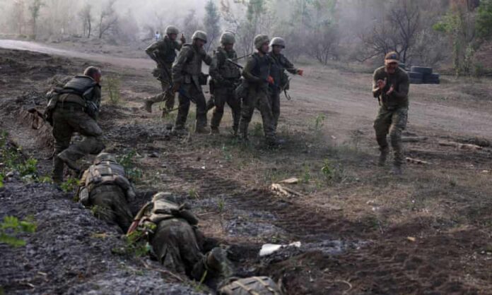 The Shkval special battalion takes part in military exercises in Donetsk, eastern Ukraine. Moscow claims it has captured another two villages in the region. Photograph: Anatolii Stepanov/AFP/Getty Images