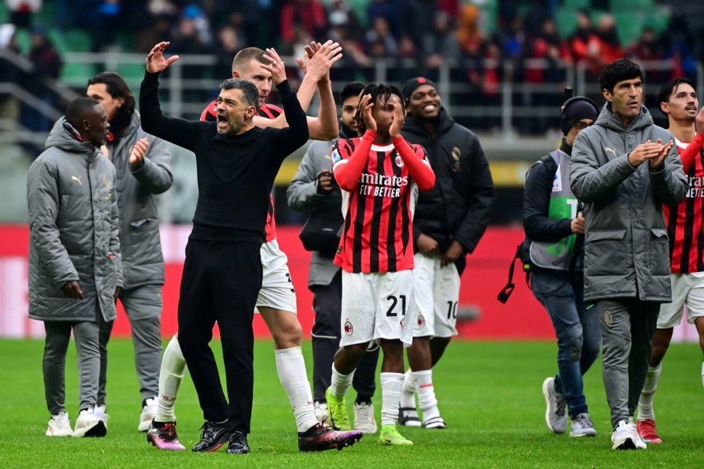AC Milan’s Portuguese coach Sergio Conceicao (3rd L) and AC Milan’s players celebrate after winning the Italian Serie A football match between AC Milan and Parma at the San Siro Stadium in Milan, Italy on January 26, 2025. (Photo by Piero CRUCIATTI / AFP)