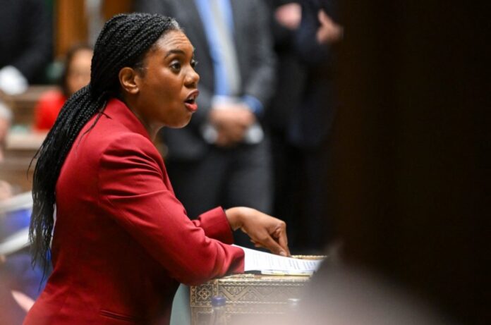 A handout photograph released by the UK Parliament shows Britain’s main opposition Conservative Party leader Kemi Badenoch standing at the despatch box and speaking during the weekly session of Prime Minister’s Questions (PMQs) at the House of Commons, in London, on February 5, 2025. (Photo by House of Commons / AFP)