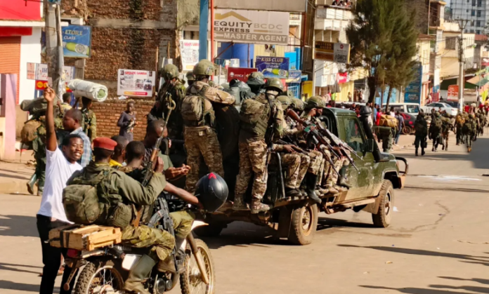 M23 rebels in downtown Bukavu. Photo: Janvier Barhahiga.