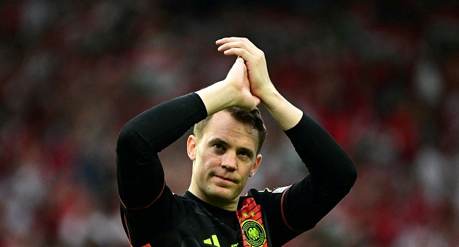 (FILES) Germany’s goalkeeper #01 Manuel Neuer celebrates after winning the UEFA Euro 2024 Group A football match between Germany and Hungary at the Stuttgart Arena in Stuttgart on June 19, 2024. (Photo by Tobias SCHWARZ / AFP)
