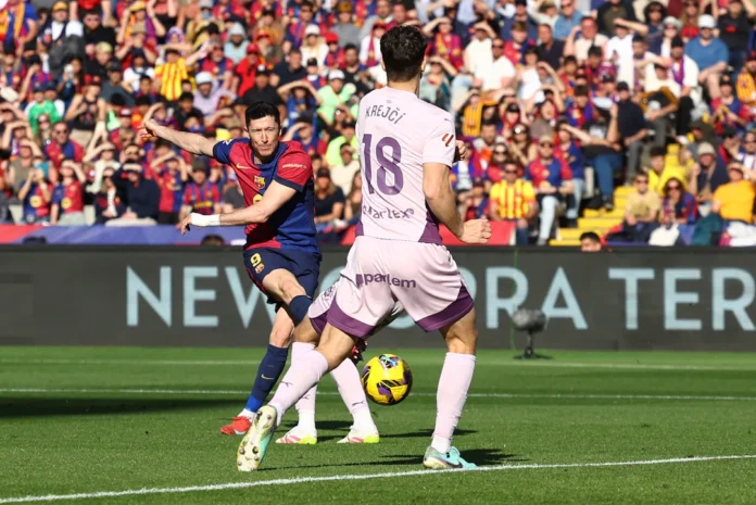 Soccer Football - LaLiga - FC Barcelona v Girona - Estadi Olimpic Lluis Companys, Barcelona, Spain - March 30, 2025 FC Barcelona's Robert Lewandowski scores their third goal REUTERS/Albert Gea