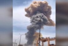 Iranian Drones Strike Kuwait Refinery for Second Day, Disrupting Eid This image grab taken from footage released by the state television Islamic Republic of Iran Broadcasting News on April 26, 2025, shows smoke billowing following an explosion at the Shahid Rajaee port dock southwest of Bandar Abbas (IRIBNEWS / AFP)