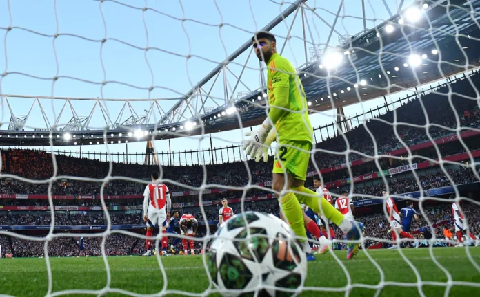 Soccer Football - Champions League - Semi Final - First Leg - Arsenal v Paris Saint Germain - Emirates Stadium, London, Britain - April 29, 2025 Arsenal's David Raya looks dejected after Paris St Germain's Ousmane Dembele scores their first goal REUTERS/Dylan Martinez 