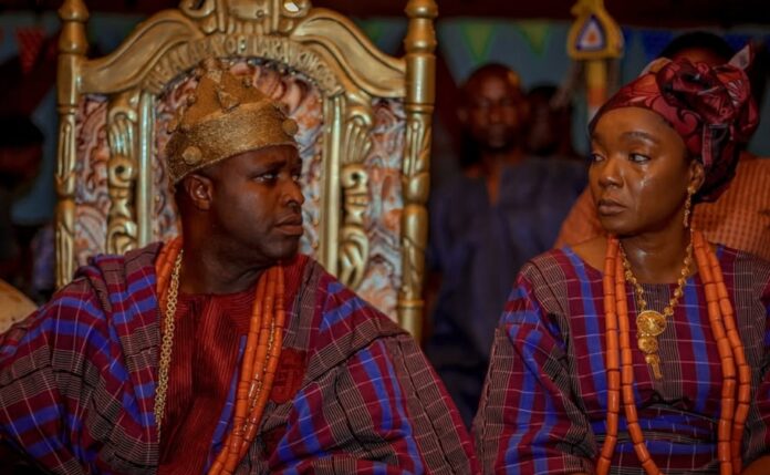 Femi Adebayo and Chioma Chukwuka in SEVEN DOORS scene
