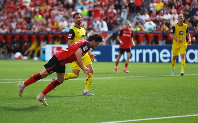 Soccer Football - Bundesliga - Bayer Leverkusen v Borussia Dortmund - BayArena, Leverkusen, Germany - May 11, 2025 Bayer Leverkusen's Jonas Hofmann scores their second goal REUTERS/Thilo Schmuelgen 
