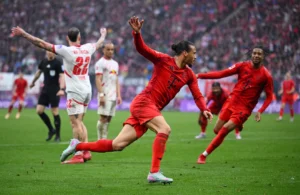 Soccer Football - Bundesliga - RB Leipzig v Bayern Munich - Red Bull Arena, Leipzig, Germany - May 3, 2025 Bayern Munich's Leroy Sane celebrates scoring their third goal REUTERS/Annegret HilseÂ