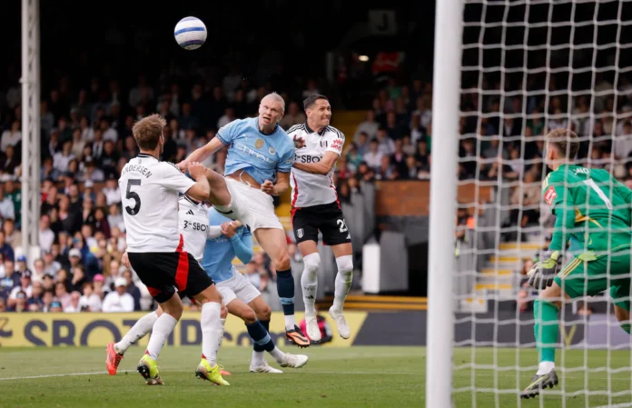 Soccer Football - Premier League - Fulham v Manchester City - Craven Cottage, London, Britain - May 25, 2025 Manchester City's Erling Haaland in action with Fulham's Sasa Lukic and Fulham's Joachim Andersen Action Images via Reuters/Andrew Couldridge