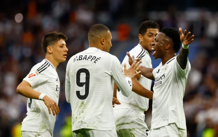 Soccer Football - LaLiga - Real Madrid v Celta Vigo - Santiago Bernabeu, Madrid, Spain - May 4, 2025 Real Madrid's Kylian Mbappe celebrates scoring their second goal with Real Madrid's Jude Bellingham, Real Madrid's Arda Guler and Real Madrid's Vinicius Junior REUTERS/Susana Vera 