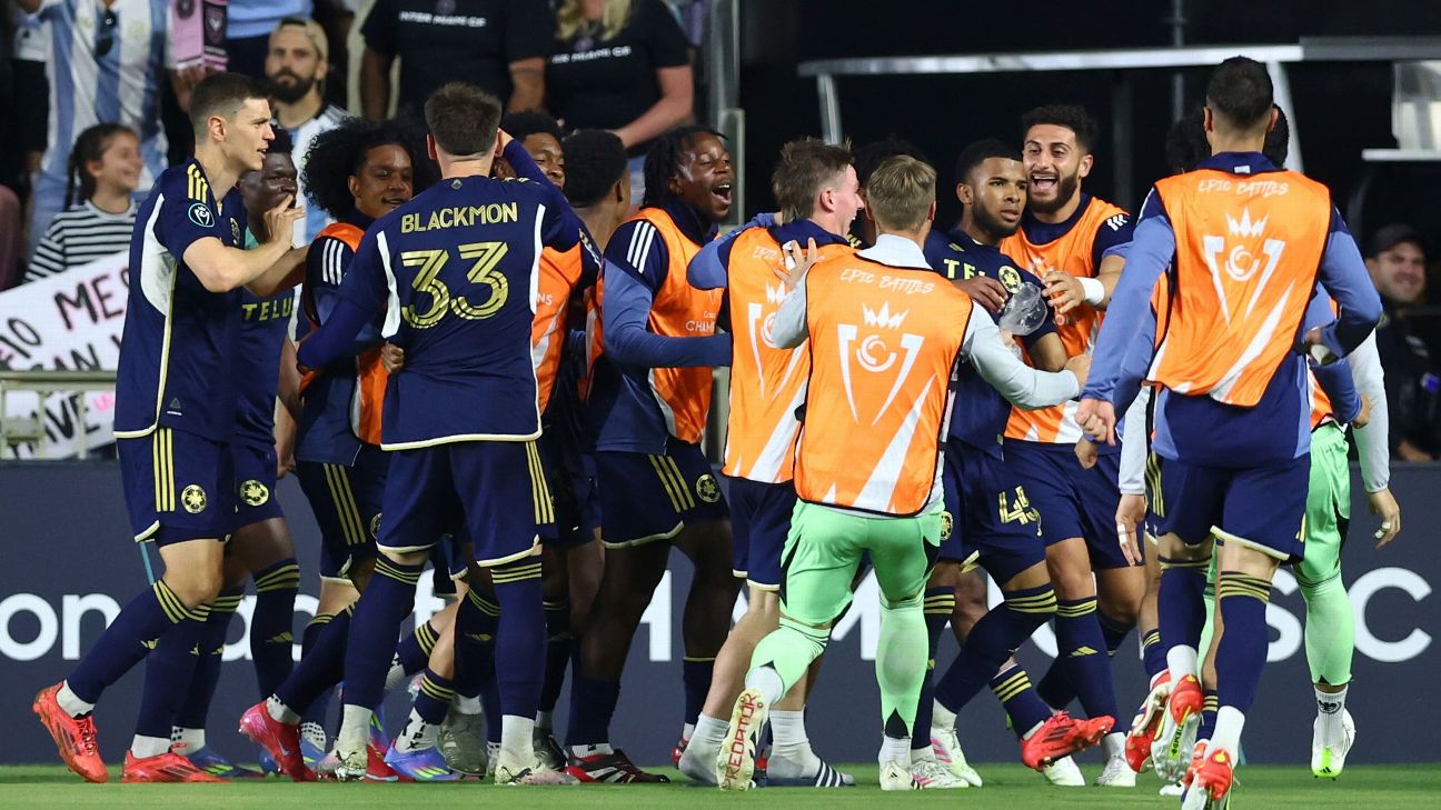 Vancouver Whitecaps players celebrate after scoring a goal against Inter Miami in the Concacaf Champions Cup.