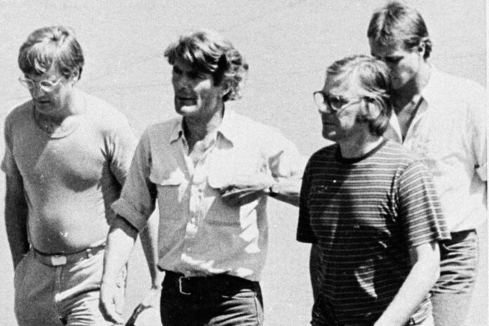 FILE - In this March 11, 1982 photo, from left, Jan Kuiper, director; Koos Koster, producer; Joop Willemsen, cameraman; and Hans ter Laag, soundman; walk north of San Salvador, El Salvador, days before they were killed. (AP Photo, File)