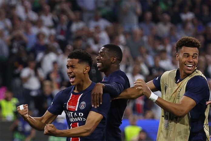 Paris Saint-Germain's French midfielder #24 Senny Mayulu (L) celebrates with Paris Saint-Germain's French forward #10 Ousmane Dembele (C) and Paris Saint-Germain's French midfielder #14 Desire Doue (R) after scoring PSG's fifth goal during the UEFA Champions League final football match between Paris Saint-Germain (PSG) and Inter Milan in Munich, southern Germany. AFP