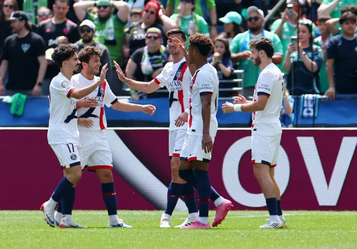 Soccer Football - FIFA Club World Cup - Group B - Seattle Sounders v Paris St Germain - Lumen Field, Seattle, Washington, U.S. - June 23, 2025 Paris St Germain's Khvicha Kvaratskhelia celebrates scoring their first goal with teammates REUTERS/Agustin Marcarian 