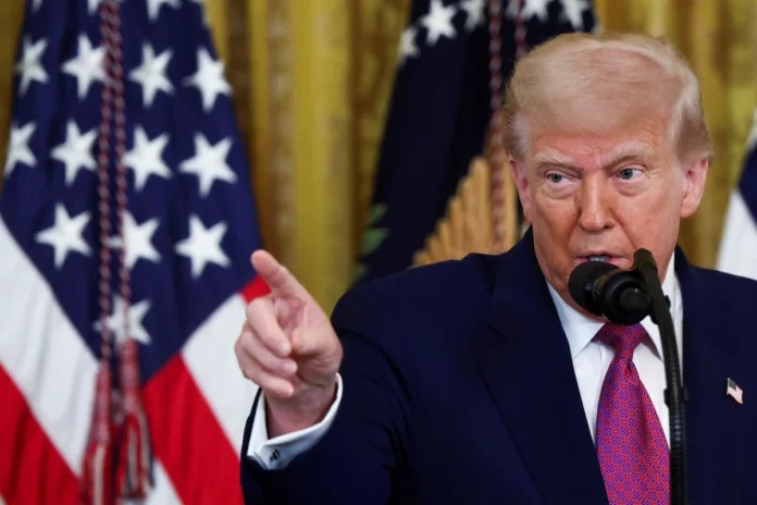 U.S. President Donald Trump speaks before signing a resolution approved by Congress to rescind the EPA's 2023 approval of California's plans to require a rising number of zero-emission heavy-duty trucks, and another resolution on California's low-NOx, or low-nitrogen oxide, regulation for heavy-duty highway and off-road vehicles and engines, at the White House in Washington, D.C., U.S., June 12, 2025. REUTERS/Evelyn Hockstein 