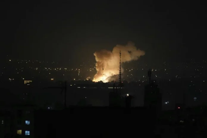Smoke rises after an explosion in Tehran, Iran, Friday, June 13, 2025. Israel attacked Iran's capital early Friday, with explosions booming across Tehran. Vahid Salemi/AP