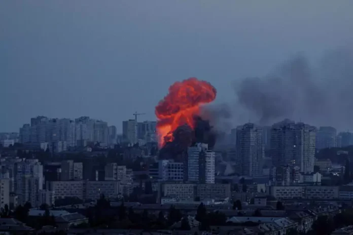 Explosion is seen after Russian air strike on Kyiv, Ukraine, on Friday. Evgeniy Maloletka/AP