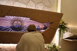 The body of Carlo Acutis in Santa Maria Maggiore church in Assisi. Photograph: Gianluigi Basilietti/EPA