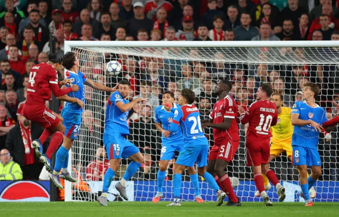 Soccer Football - UEFA Champions League - Liverpool v Atletico Madrid - Anfield, Liverpool, Britain - September 17, 2025 Liverpool's Virgil van Dijk scores their third goal Action Images via Reuters/Andrew Boyers 