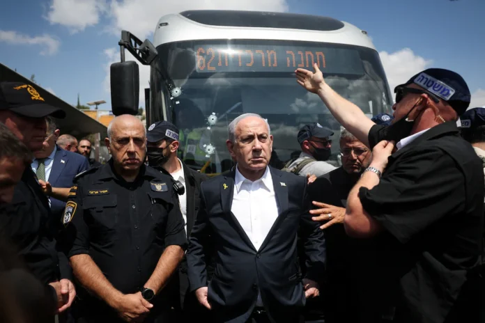 Israel's Prime Minister Benjamin Netanyahu visits the scene where a suspected shooting attack took place at the outskirts of Jerusalem September 8, 2025 REUTERS/Ronen Zvulun/Pool