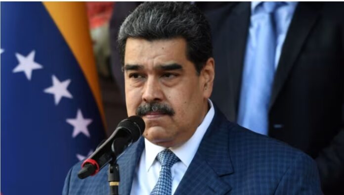 Venezuelan President Nicolas Maduro speaks with the press after holding a meeting with FIFA president Gianni Infantino at the Miraflores Presidential Palace in Caracas, on October 15, 2021.  Federico Parra/AFP/Getty Images
