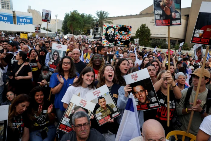 People react as they gather at 