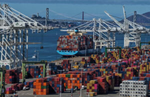 A container ship sits docked at the Port of Oakland on October 10, 2025 in Oakland, California. US President Donald Trump has impose da massive increase of tariffs on Chinese imports in response to China's announcement of new export controls on rare earths. (Getty Images via AFP)