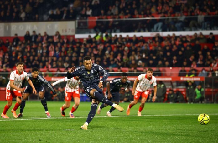 Soccer Football - LaLiga - Girona v Real Madrid - Estadi Montilivi, Girona, Spain - November 30, 2025 Real Madrid's Kylian Mbappe scores their first goal from the penalty spot REUTERS/Albert Gea