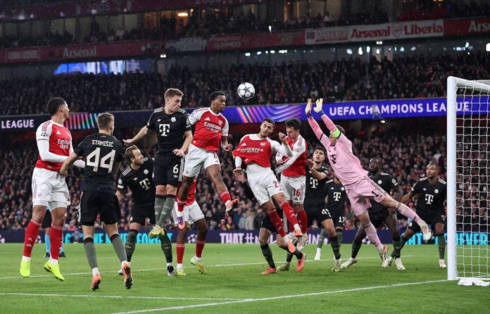 Soccer Football - UEFA Champions League - Arsenal v Bayern Munich - Emirates Stadium, London, Britain - November 26, 2025 Arsenal's Jurrien Timber scores their first goal REUTERS/David Klein