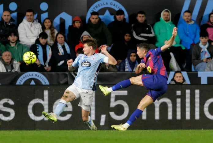 Soccer Football - LaLiga - Celta Vigo v FC Barcelona - Estadio de Balaidos, Vigo, Spain - November 9, 2025 FC Barcelona's Robert Lewandowski shoots at goal REUTERS/Miguel Vidal