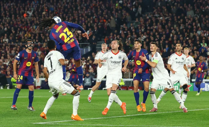 Soccer Football - UEFA Champions League - FC Barcelona v Eintracht Frankfurt - Camp Nou, Barcelona, Spain - December 9, 2025 FC Barcelona's Jules Kounde scores their second goal REUTERS/Albert Gea 