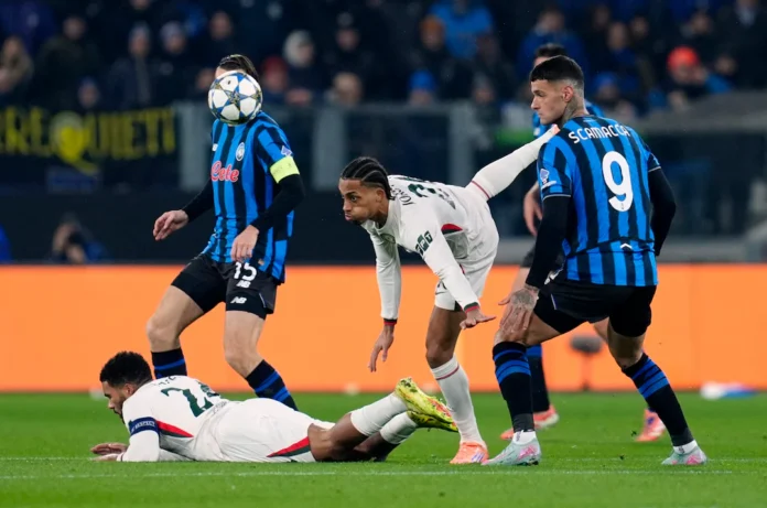 Soccer Football - UEFA Champions League - Atalanta v Chelsea - Gewiss Stadium, Bergamo, Italy - December 9, 2025 Chelsea's Joao Pedro in action with Atalanta's Gianluca Scamacca REUTERS/Matteo Ciambelli