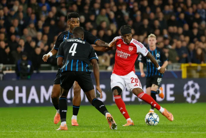 Soccer Football - UEFA Champions League - Club Brugge v Arsenal - Jan Breydel Stadium, Bruges, Belgium - December 10, 2025 Arsenal's Noni Madueke scores their first goal REUTERS/Geert Vanden Wijngaert